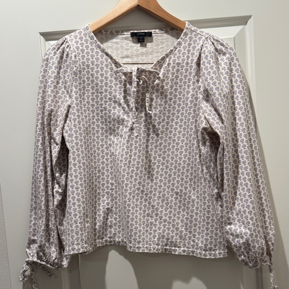 J. Crew Cream Blouse with Light Purple Print and Tie Neck